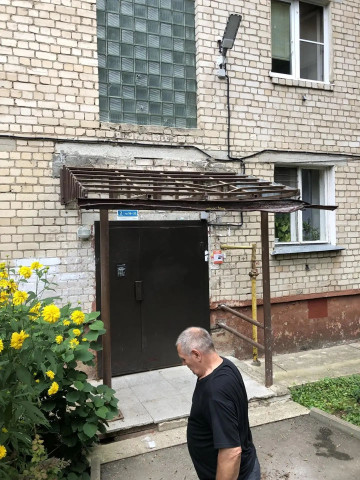 Работы по замене кровельного покрытия козырька над входом во второй подъезд дома по адресу ул. Гурьянова, д. 5 выполнены в полном объеме